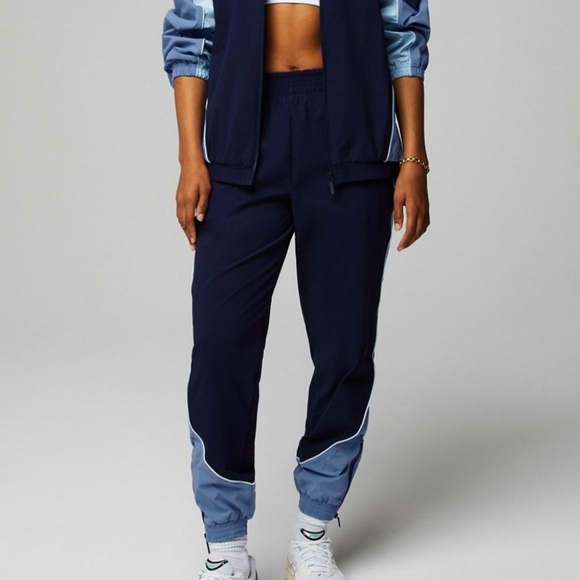NWT, Fabletics Women’s Relay Track Pant in Deep Navy/Elemental Blue/Iced Out, L - Picture 1 of 11